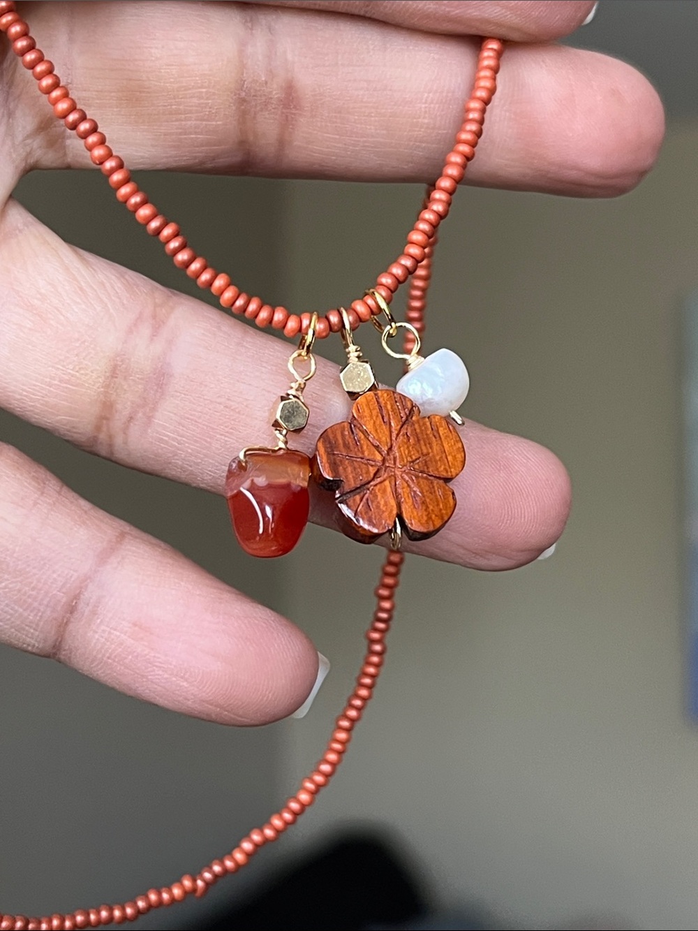 Gold-Tone Rust Beaded Necklace with Charms